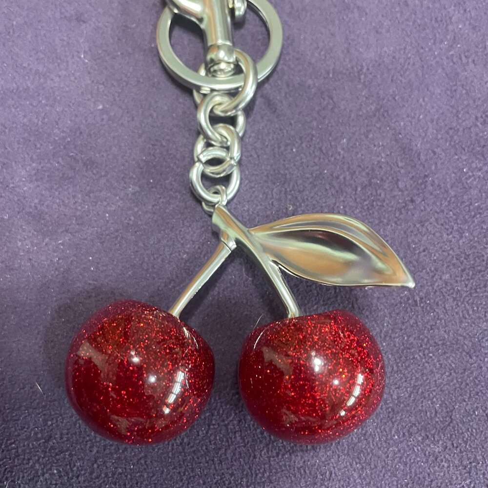 LARGE CHERRY BAG CHARM - GOLDTONE